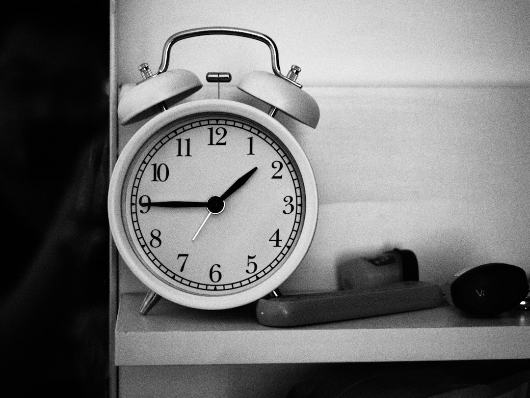 a clock on a shelf
