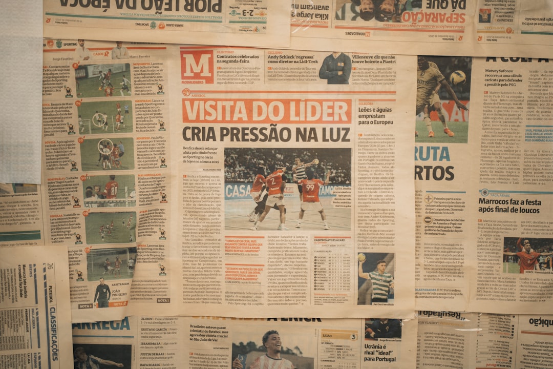 Newspaper headlines and articles displayed on a wall